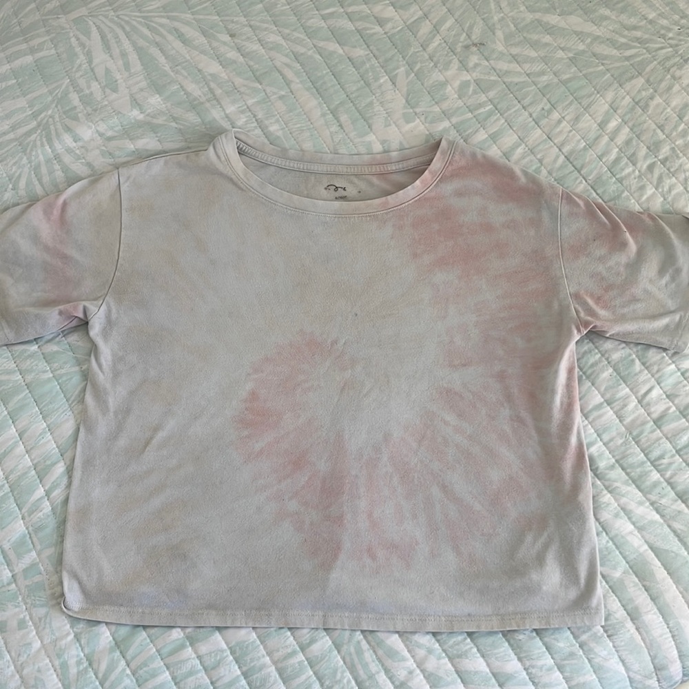 Cream and white tye dye shirt girls . Not that bright reason for price.